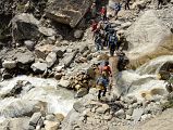 27 Crossing A Stream Between Hinku Cave And Deurali On Trek To Annapurna Sanctuary